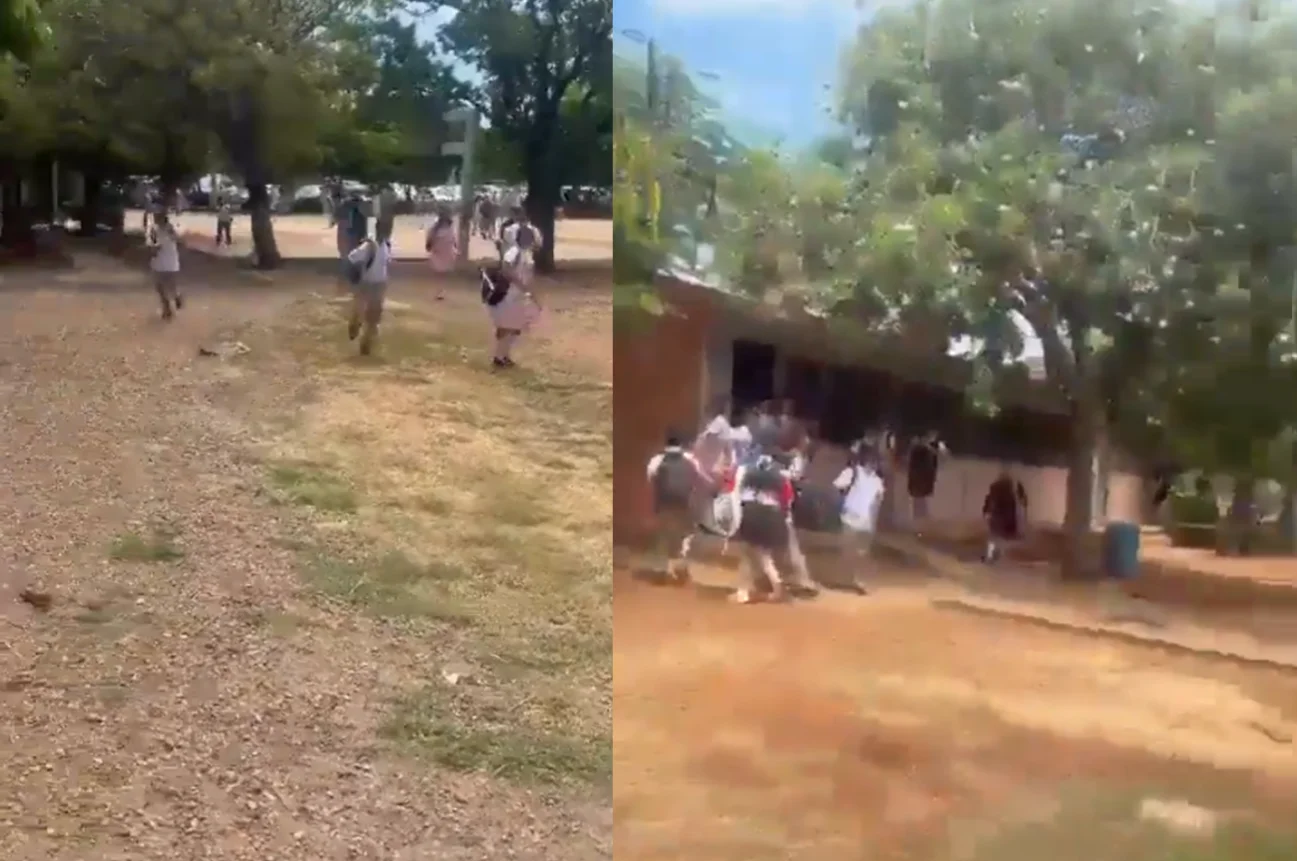Alumnos corren en pánico tras escuchar una balacera cerca de su escuela.